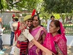 49-year-old homeguard Mamta Kaushik from Lalitpur with her daughter Anjali, 20, who joined as a constable. (HT Photo)