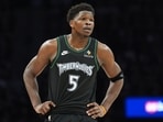 Minnesota Timberwolves guard Anthony Edwards (5) stands on the court during the first half in Game 3 of a first-round NBA basketball playoff series against the Denver Nuggets