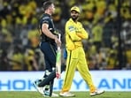 Jos Buttler (L) speaks with Chennai Super Kings' captain Ruturaj Gaikwad at the end of the 2026 IPL match against Gujarat Titans
