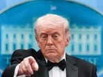 Donald Trump takes questions from media at a press briefing at the White House