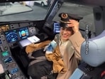 A New York woman overcame her fear of rejection at an airport after asking a Delta pilot for a photo and receiving a warm response.