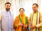 Haryana chief minister Nayab Singh Saini and state BJP president Mohan Lal Badoli (extreme right) welcoming Upinder Kaur Ahluwalia into the saffron fold in Panchkula on Saturday. (SANT ARORA/HT)