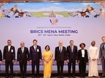 In this April 24 image, Ministry of External Affairs secretary (South) Neena Malhotra poses for a group photograph during the BRICS MENA meeting, in New Delhi. (@MEAIndia/via PTI)