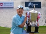 Jeongwoo Ham of Korea poses with the trophy after winning the Singapore Open at Sentosa Golf Club. (Asian Tour)