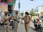 Senior officials, including DCP (traffic) Raveena Tyagi, at Kamta crossing. (Sourced)