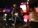 A US Secret Service agent leaves the investigation scene near a house associated with the suspected White House Correspondents' Dinner shooter in Torrance, California,.