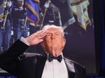 U.S. President Donald Trump salutes during the annual White House Correspondents' Association dinner in Washington, DC, US., April 25, 2026.