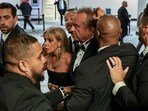 Security officials evacuate U.S. Health and Human Services (HHS) Secretary Robert F. Kennedy Jr. and his wife, Cheryl Hines, as a shooter opens fire during the annual White House Correspondents' Association dinner in Washington, D.C., U.S., April 25, 2026. REUTERS/Jonathan Ernst(REUTERS)