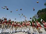 Women recruits of the Uttar Pradesh Police celebrate after successfully completing their training during the Recruit Passing-Out Parade at Reserve Police Lines in Lucknow. (Deepak Gupta/ HT)