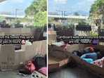 A viral video shows women sitting and sleeping in large cardboard boxes in Hong Kong A viral video shows women sitting and sleeping in large cardboard boxes in Hong Kong