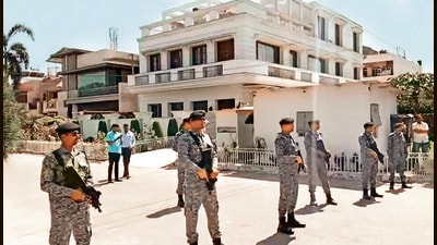 Security personnel stand guard outside the residence of Harbhajan Singh in Jalandhar on Sunday. (ANI Video Grab) Security personnel stand guard outside the residence of Harbhajan Singh in Jalandhar on Sunday. (ANI Video Grab)
