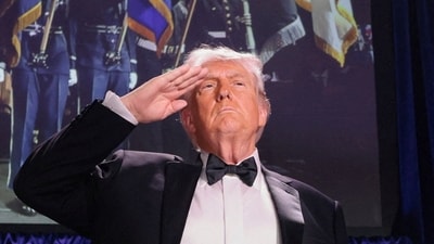 U.S. President Donald Trump salutes during the annual White House Correspondents' Association dinner in Washington, DC, US., April 25, 2026. (REUTERS)