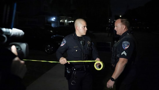 Law enforcement officials block a street at an address connected to Cole Tomas Allen, the shooting suspect at the White House Correspondents Dinner on Saturday, April 25, 2026, in Torrance, Calif. (AP Photo/Ethan Swope)(AP)