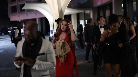 Attendees depart after shots were fired during the White House Correspondents dinner at the Washington Hilton in Washington, DC, on April 25, 2025. Shots were fired as US President Donald Trump attended a media gala in Washington on Saturday night, with the gunman detained at a screening area just outside the hotel ballroom where hundreds of guests had gathered. (Photo by Alex Wroblewski / AFP)(AFP)