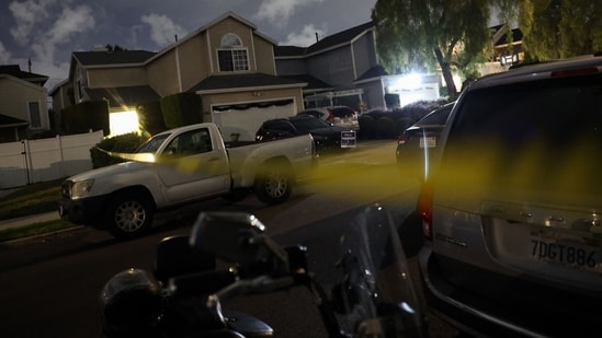 Police tape blocks off the area near the home of the alleged White House Correspondents Dinner shooter after the arrival of FBI agents, in Torrance, California, on April 25, 2026.&nbsp;(AFP)