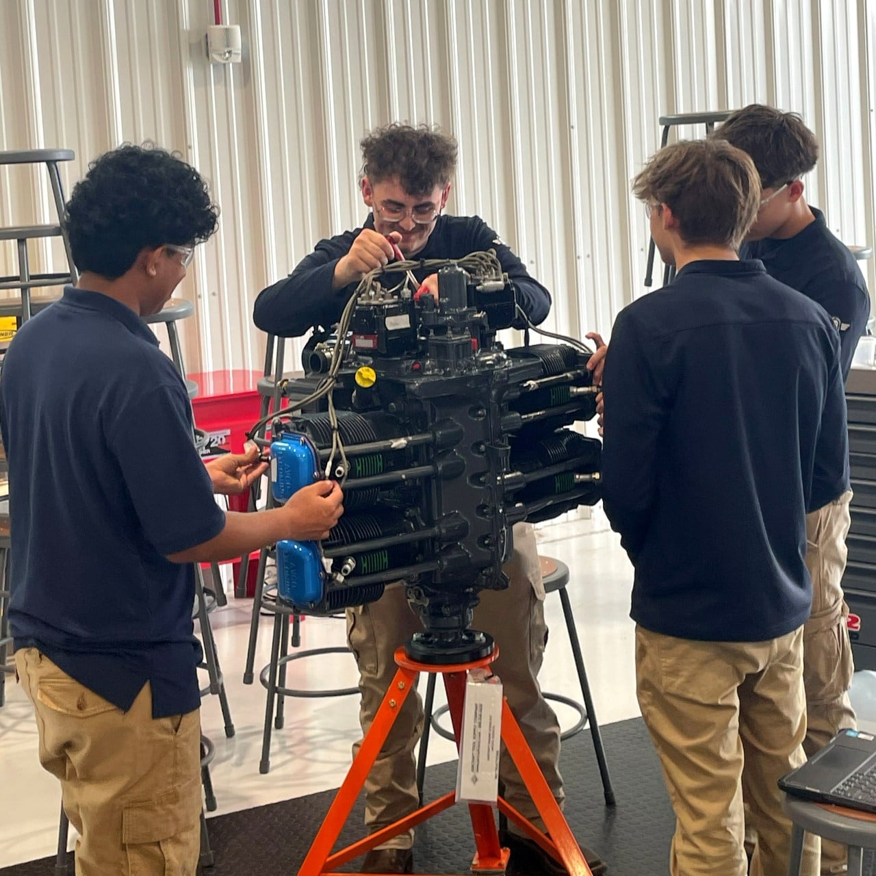 Coltin Stidham, second from left, at Butler Tech Aviation Center.
