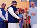 BJP national general secy BL Santhosh (extreme right) and UT administrator Gulab Chand Kataria during the lamp lighting ceremony at Punjab Lok Bhavan on Sunday. (HT Photo)