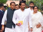 Deputy chief minister Sunetra Pawar (right), with her sons Parth (centre), and Jay Pawar (second from right). (HT FILE)
