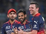RCB’s Bhuvneshwar Kumar (C) and Josh Hazlewood during the IPL match against DC. (Sanchit Khanna/HT)
