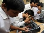 School students learning computer hardware repair (For representation only)