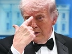 US President Donald Trump gestures as he speaks during a press briefing shortly after a shooting incident at the White House Correspondents' Dinner on April 25, 2026.