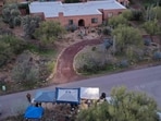 TUCSON, AZ - FEBRUARY 21: In an aerial view, the home of Nancy Guthrie is seen on February 21, 2026, in Tucson, Arizona. (Photo by JOE RAEDLE / GETTY IMAGES NORTH AMERICA / Getty Images via AFP)