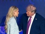 President Donald Trump greets Turning Point CEO Erika Kirk at a Turning Point USA event Friday, April 17.