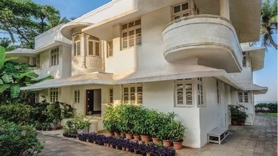 Mumbai real estate: A rare sea-facing, heritage 6BHK Art Deco bungalow named Leela in Juhu, owned by the Nanavati family, has been sold to Notandas Realty, an arm of the Mahesh Notandass Jewellers Group, for ₹221 crore. (JLL India Photo) Mumbai real estate: A rare sea-facing, heritage 6BHK Art Deco bungalow named Leela in Juhu, owned by the Nanavati family, has been sold to Notandas Realty, an arm of the Mahesh Notandass Jewellers Group, for ₹221 crore. (JLL India Photo)