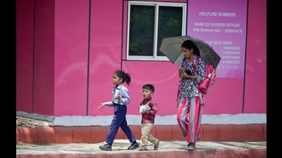 People are seen protecting themselves from the heat on Monday. (RAJ K RAJ /HT PHOTO) People are seen protecting themselves from the heat on Monday. (RAJ K RAJ /HT PHOTO)