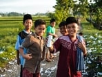 A cheerful group of Indonesian boys. (Shutterstock)