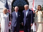 President Donald Trump and first lady Melania Trump greet Britain's King Charles III and Queen Camilla as they arrive at the White House