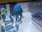 Krishna Bhushan Prasad (in blue shirt) attempted to overpower one of the assailants but was attacked by his accomplices. Krishna Bhushan Prasad (in blue shirt) attempted to overpower one of the assailants but was attacked by his accomplices.