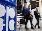 FILE PHOTO: People walk past an installation depicting barrel of oil with the logo of Organization of the Petroleum Exporting Countries (OPEC) (REUTERS)