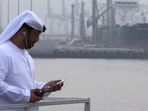 An Emirati man stands at the oil terminal of Fujairah during the inauguration ceremony of a dock for supertankers on September 21, 2016. The United Arab Emirates will withdraw from the OPEC and OPEC+ oil cartels on May 1, 2026 state media said on April 28, 2026, calling it a strategic decision by the major producer.