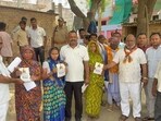 Invitation cards have been handed over to women for the conference in Varanasi. (HT Photo)