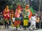 Artistes perform during a BJP rally in Kolkata on Monday.