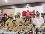 Patiala deputy inspector general of police Kuldeep Chahal and SSP Varun Sharma addressing a press conference after the arrest of the four members of the Pakistan-backed terror module on Tuesday. (HT Photo)