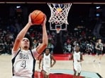 Tyran Stokes, playing for Team USA attempts a layup past Ikenna Alozie #1 of the Team World during the second half at Moda Center on April 11.