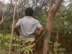 The woman could not capture the man's face on camera 