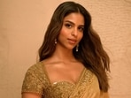 Suhana Khan dazzles in a gold tissue saree. 