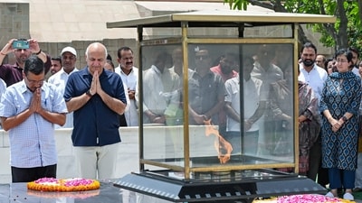 AAP National Convenor Arvind Kejriwal pays homage to Mahatma Gandhi at Rajghat, in New Delhi on Tuesday. AAP national leader Manish Sisodia and Delhi Assembly LoP Atishi also present. (ANI Photo/Jitender Gupta) (Jitender Gupta) AAP National Convenor Arvind Kejriwal pays homage to Mahatma Gandhi at Rajghat, in New Delhi on Tuesday. AAP national leader Manish Sisodia and Delhi Assembly LoP Atishi also present. (ANI Photo/Jitender Gupta) (Jitender Gupta)