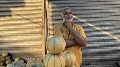Fruit seller Zareef is selling muskmelons—kharbooja. (HT Photo) Fruit seller Zareef is selling muskmelons—kharbooja. (HT Photo)