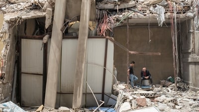 People inside a destroyed building, amid a temporary ceasefire between Lebanon and Israel, in Tyre, southern Lebanon. (Photo for representation) (REUTERS)