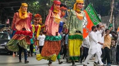 Artistes perform during a BJP rally in Kolkata on Monday. (PTI) Artistes perform during a BJP rally in Kolkata on Monday. (PTI)