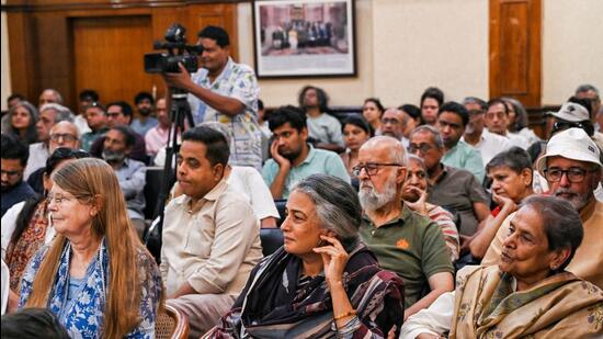 Family members, friends, and colleagues of photojournalist Raghu Rai and British journalist Mark Tully during a memorial meeting at the Press Club of India, in New Delhi, on Tuesday. (ANI)