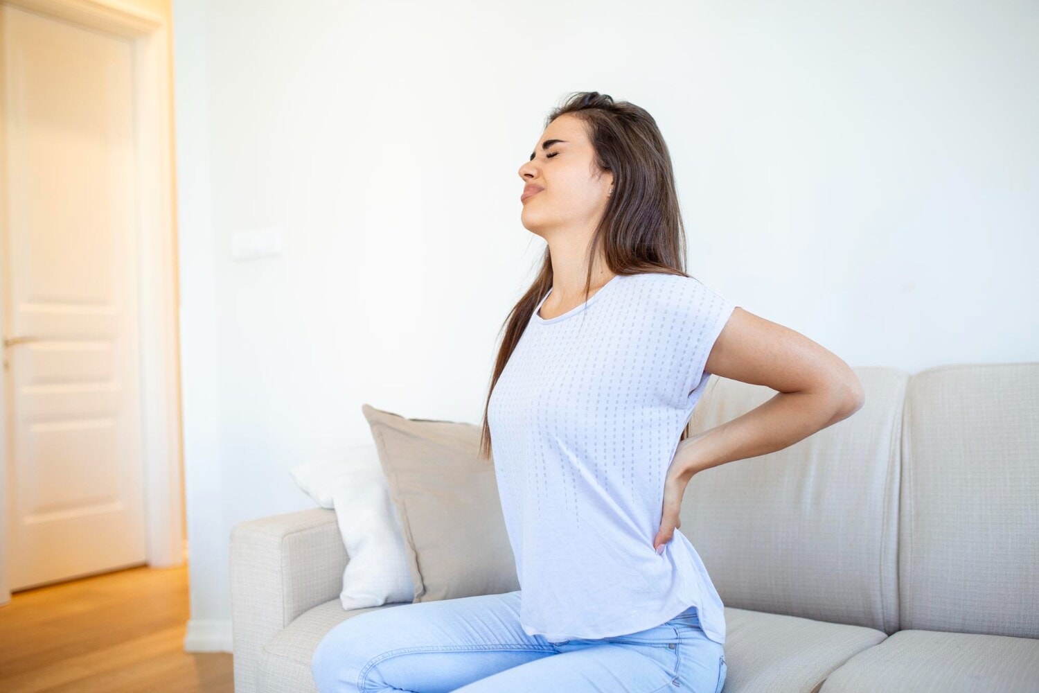Sitting for long hours drives back pain. (Picture credit: Freepik) Sitting for long hours drives back pain. (Picture credit: Freepik)