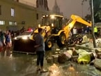 A compound wall of Bowring and Lady Curzon Hospital in Shivajinagar collapsed as heavy rain lashed parts of Bengaluru on Wednesday evening. (Screengrab/ ANI)