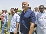 AAP convenor Arvind Kejriwal along with Manish Sisodia and others pays homage to Mahatma Gandhi, at Raj Ghat, in New Delhi. (HT Photo/Sanjeev Verma)