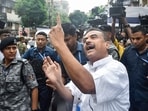 West Bengal Leader of Opposition and BJP candidate from Bhabanipur, Suvendu Adhikari, shows his inked finger after voting in the second and final phase of the West Bengal assembly elections 2026, in Kolkata on Wednesday.
