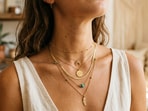 Find out how to layer your necklace without feeling sweaty, this summer!(Picture credit: Gemini AI)